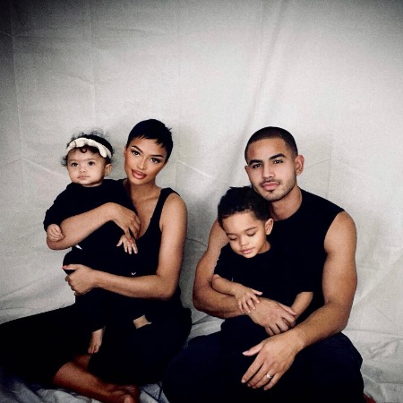 Giovanni Morales and Chrissy Stokes with their children.